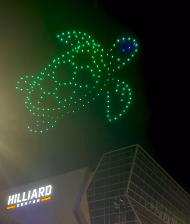 Aerial still of the Hilliard Center drone light show