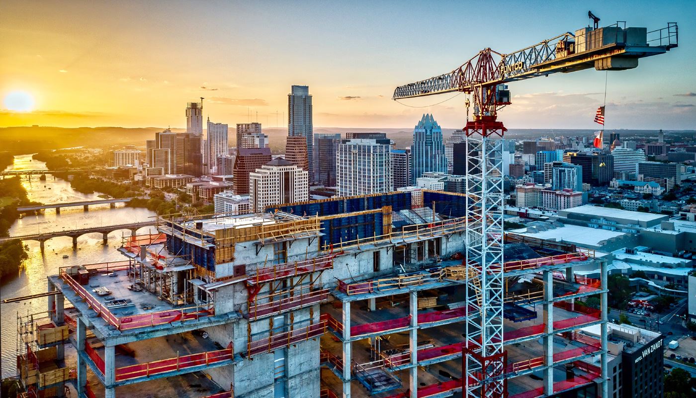 Image of tower crane on a jobsite.