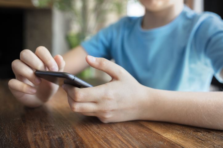 child on phone