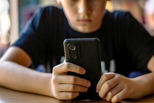 child on phone