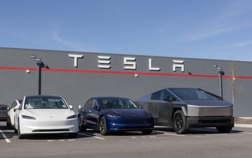 Indianapolis - February 28, 2025: Tesla EV electric vehicle Service Center. Tesla models include the Cybertruck, Model 3, Model Y, Model X and Model S.
